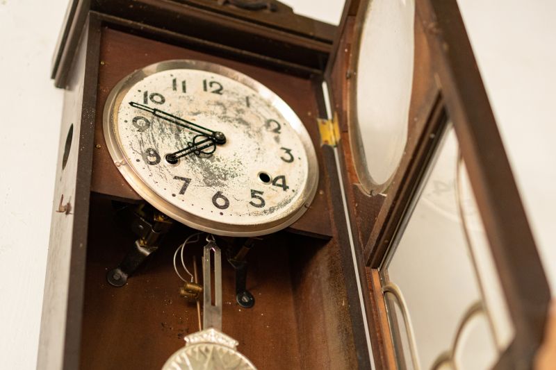 Careful Handling of Antique Clocks
